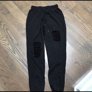 Ripped black sweatpants